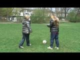 Katharina and her friend wearing shiny nylon rainwear while playing soccer (Video)