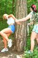 Jill ties and gagges an archive girl outdoor on a tree both wearing shiny nylon shorts and shirts (Pics)