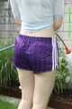 Watch Chloe watering the Garden enjoying her shiny nylon Shorts