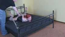 Jessy defenseless on the bed