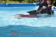 Mara sunbathing and swimming wearing supersexy crazy sensation shiny nylon downwear (Pics)
