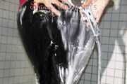 Watching Mara taking a shower and foaming herself with sexy shiny nylon rainwear (Pics)