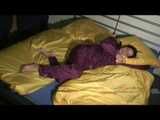 ENNI wearing a sexy purple shiny nylon rain suit lying in bed with yellow shiny nylon cloths lolling and posing (Video)