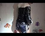 Sonja taking a bath wearing a sexy black shiny nylon shorts and a black rain jacket (Video)