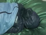 0055 min video with an beautiful archive girl in blue rainwear double hooded, tied and gagged in bed