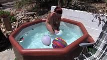 a jakuzzi full of balloons