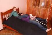 Catt and Alexa - Naughty girl tied up before joining helpless girlfriend on the bed