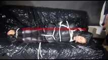 Sexy Sandra being tied and gagged with ropes on a sofa wearing a sexy black down pants and a black shiny nylon down jacket (Video)