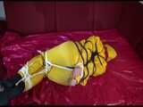 Get 2 Videos with Lucy bound and gagged enjoying her shiny nylon Rainwear from our 2021 Archive