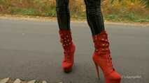 Black gloss leggings and red boots