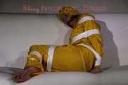 Watching Pia being tied and gagged with tape and a cloth gag wearing sexy yellow shiny nylon rainwear (Pics)