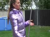 Watch Sandra taking a shower in her new purple shiny nylon down jacket 