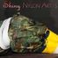 Sexy PIA being tied and gagged with tape and a clothgag on the sofa wearing a camouflage rainsuit and yellow rubber boots (Pics)