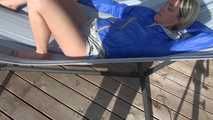 SEXY Sonja wearing sexy shiny nylon shorts enjoying the sun and the shorts in a hammock (Video)