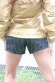 Enni having a good time outdoor wearing sexy shiny nylon shorts and a top posing for the camera (Pics)