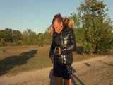 Watch Sandra enjoying her shiny nylon Downjacket at very warm Wearther outside