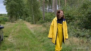 Miss Petra goes for a walk in friesennerz, yellow rain dungarees and rubber boots