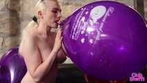 470 Chrissy pops 3 of her logo balloons