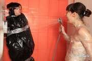 Anni Bay and Dakota - trash bag in the shower