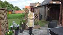 Miss Petra in Schmuddelwedda nylon raincoat with transparent Rains raincoat and Ilse Jacobsen rainpants