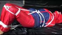 ***SANDRA*** tied and gagged with ropes on the floor wearing a supersexy oldschool down suit (Video)