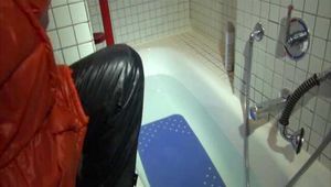 Get 2 Videos with Sandra enjoying a bath in her Shiny Nylon Downwear from our 2016 Archive