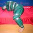 Jill tied, gagged and hooded on a sofa with tape wearing supersexy shiny nylon oldschool rainwear (Pics)