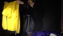 Watching sexy Sandra wearing different shiny nylon rainwear and preparing bed  (Video)