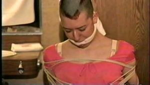 PUNK MELA IS BAREFOOT,MOUTH STUFFED, CLEAVE GAGGED, TOE-TIED & TRIES TO MAKE PHONE CALL (D43-11)