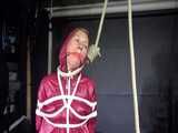 Watch Sandra bound gagged and noosed wearing her shiny nylon Rainwear