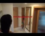 Sonja cleaning up the corridor wearing a very hot red shiny nylon shorts and an oldschool red/blue rain jacket (Video)