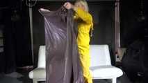 Watching Pia preparing her sofa with a shiny nylon cloth wearing a yellow shiny nylon rainsuit enjoying herslef on the sofa (Video)