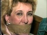 44 Yr OLD HOUSEKEEPER WRAP TAPE TIED AND GAGGED, HANDGAGGED & F0RCED TO SMELL HER STINKY SWEATY HIGH HEEL SHOE (D56-14)