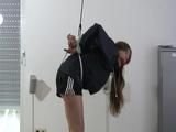 Katharinna tied, gagged and crotchroped on the ceiling wearing a sexy black shiny nylon shorts and a shiny black rain jacket (Video) 