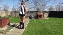 Watching Pia sweeping the terrace wearing a sexy black shiny nylon shorts, a striped top and black rubber boots (Video)