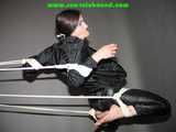 Get 101 Pictures with Lupi tied and gagged in shiny nylon rainwear from 2005-2008!