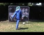 Mara wearing a blue rainwear combination while playing soccer with herself (Video)