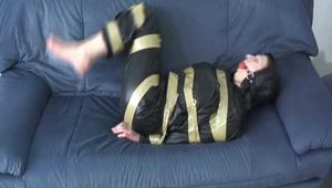 Get 3 classic archive videos with Katharina bound and gagged in shiny nylon rainwear