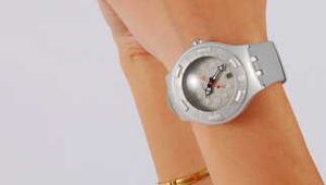 Evita wearing a Swatch Scuba watch 