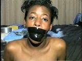 BLACK SHONDA IS WRAP TAPE GAGGED & BOUND UP WITH BLACK ELECTRICAL TAPE (D33-10)