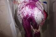 Sexy Sonja wearing a sexy purple downsuit foaming herself with shaving cream (Pics)