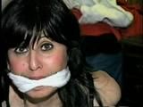 40 Yr OLD HAIRDRESSER CHER IS BALL-GAGGED, DROOLING, HOG-TIED, CLEAVE-GAGGED AND HANDGAGGED (D59-5)