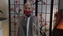 Miss Francine is bound and gagged in her nice tight PVC pants covered with a transparent raincoat