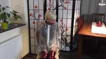 Miss Francine is bound and gagged in her nice tight PVC pants covered with a transparent raincoat