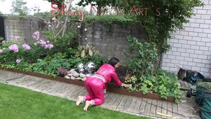 Watching Aiyana wearing supersexy pink shiny nylon rainwear while planting flowers in the garden (Pics)