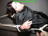 Get 101 Pictures with Lupi tied and gagged in shiny nylon rainwear from 2005-2008!