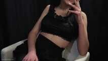 Stunning Russian lady in black smoking two 100s in a row