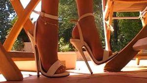 extreme high heels dangling
