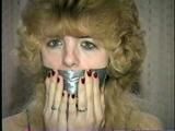 CUTIE FACE TERRI TAKES OFF HER DRESS THEN TIES & GAGS HERSELF WITH TAPE & HANDCUFFS HERSELF (D41-3)