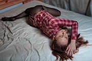 Hard tied hips in pantyhose and checkered blouse
